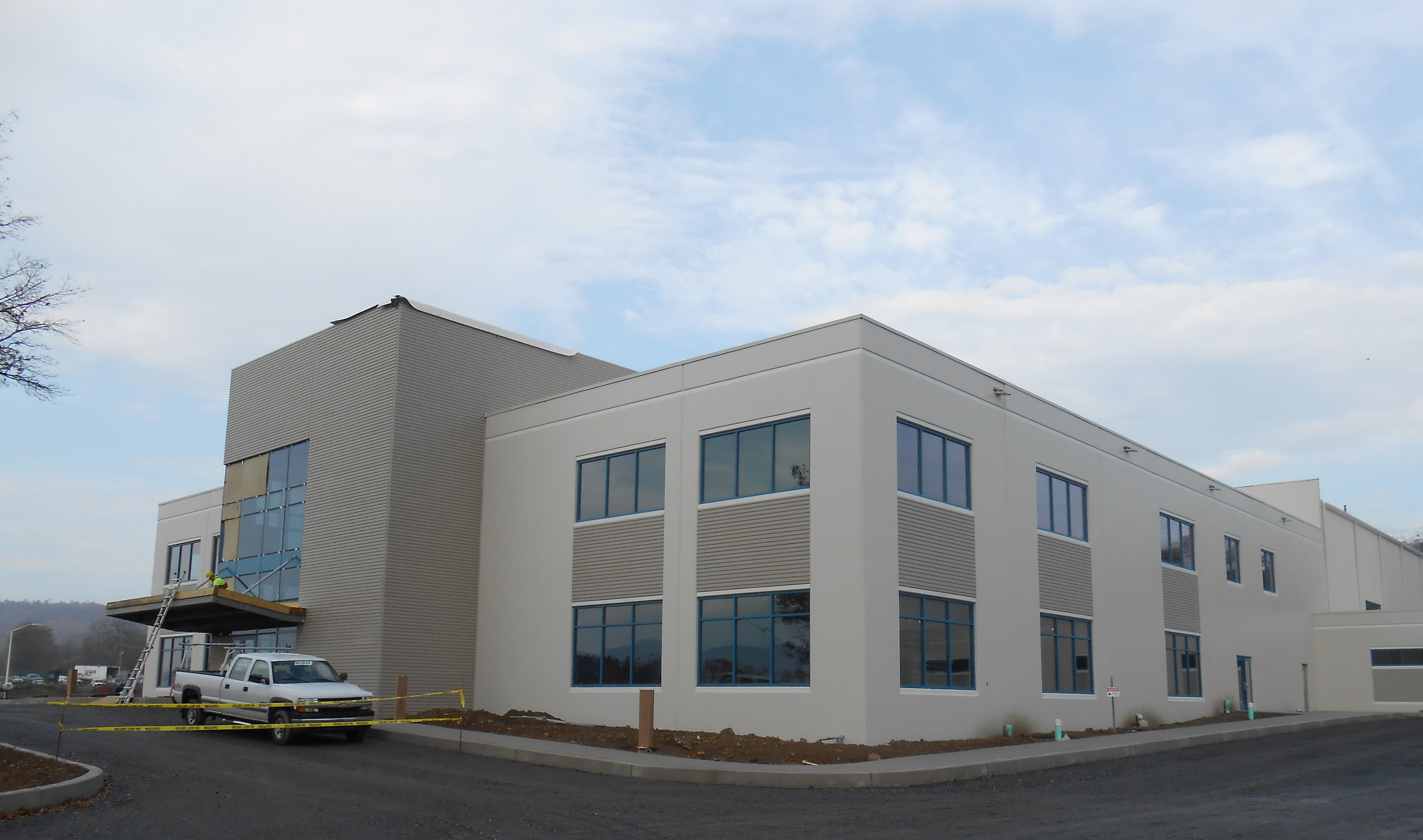 The Zartman team works on the GE Inspection Technologies building.