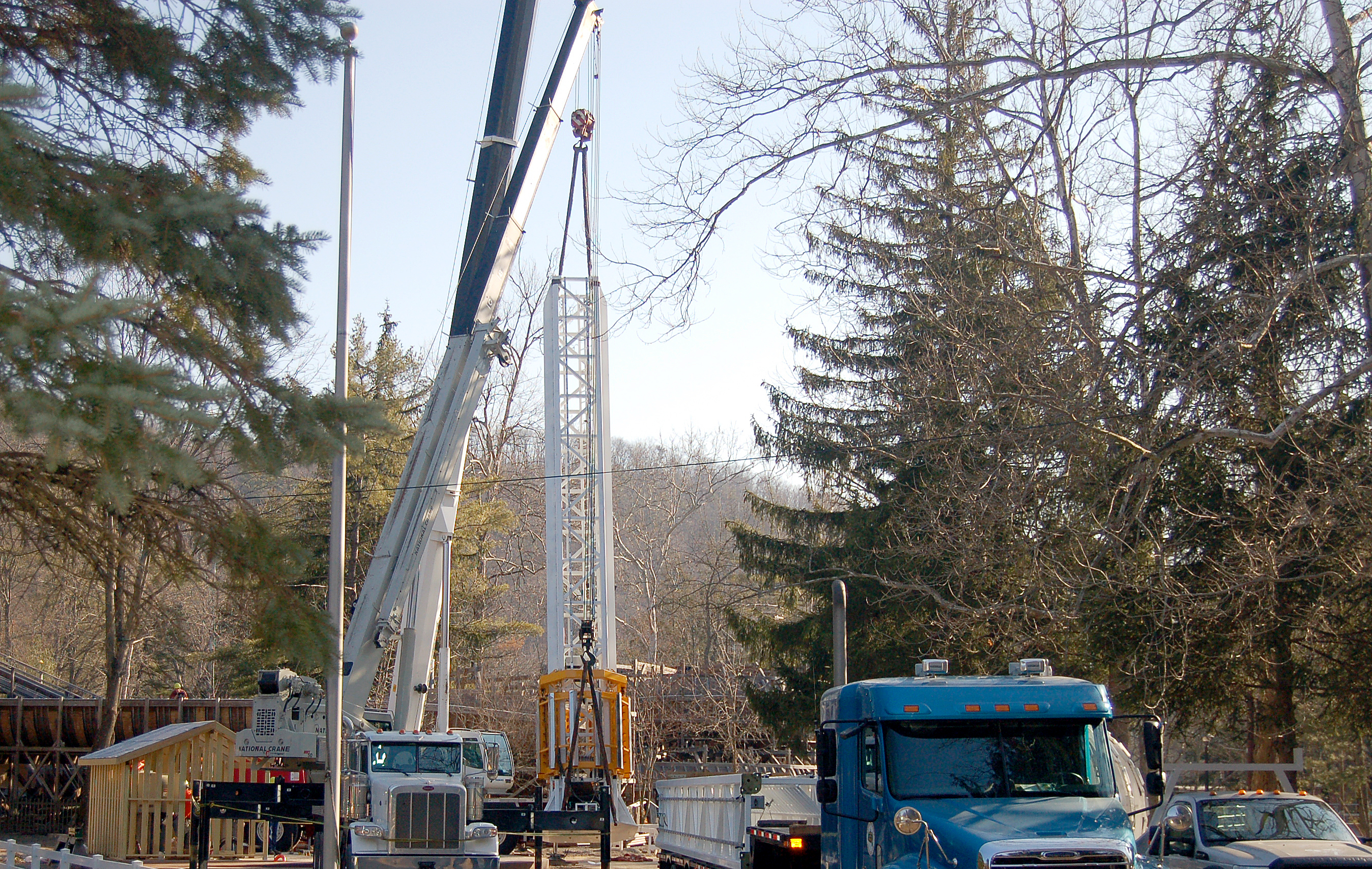 Part of the Stratos Fear is lifted off the trailer bed before being placed at Knoebels Amusement Resort.