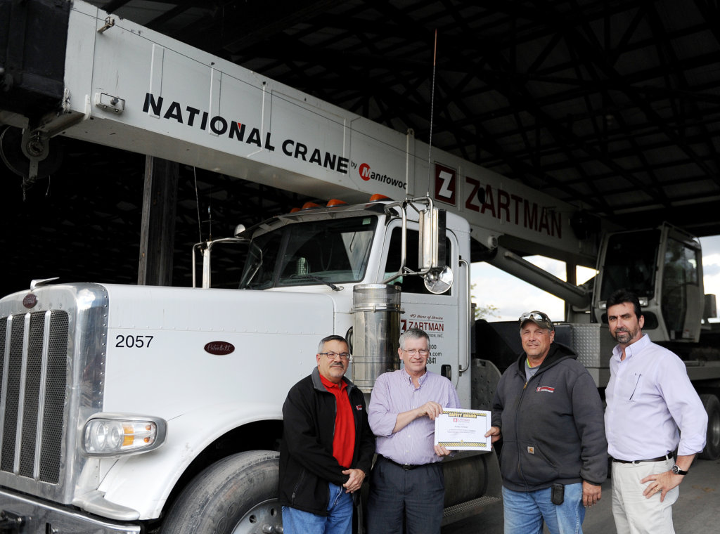 Andy Switzer is presented with his 50,000 safety hours award.