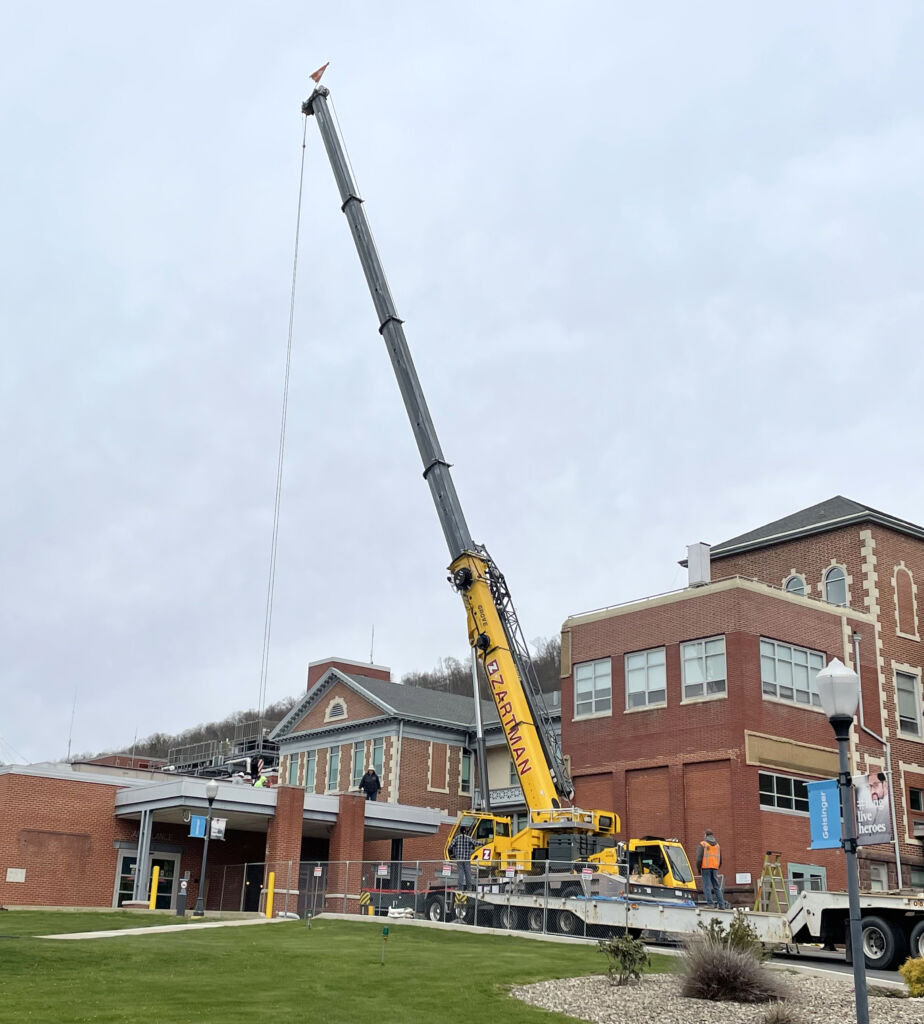 115 ton crane on location for HVAC company.