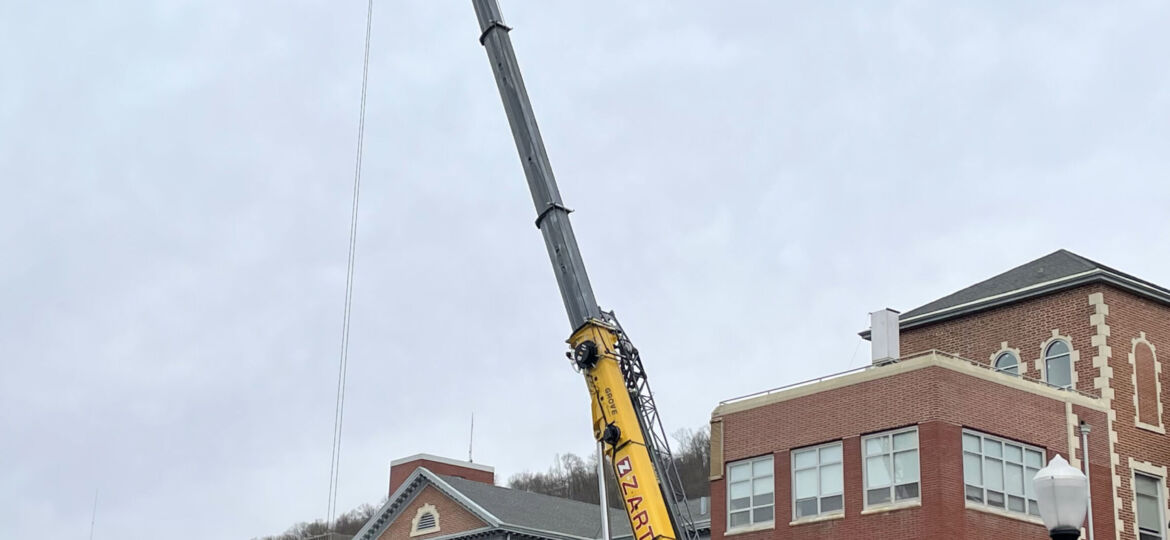 115 ton crane on location for HVAC company.