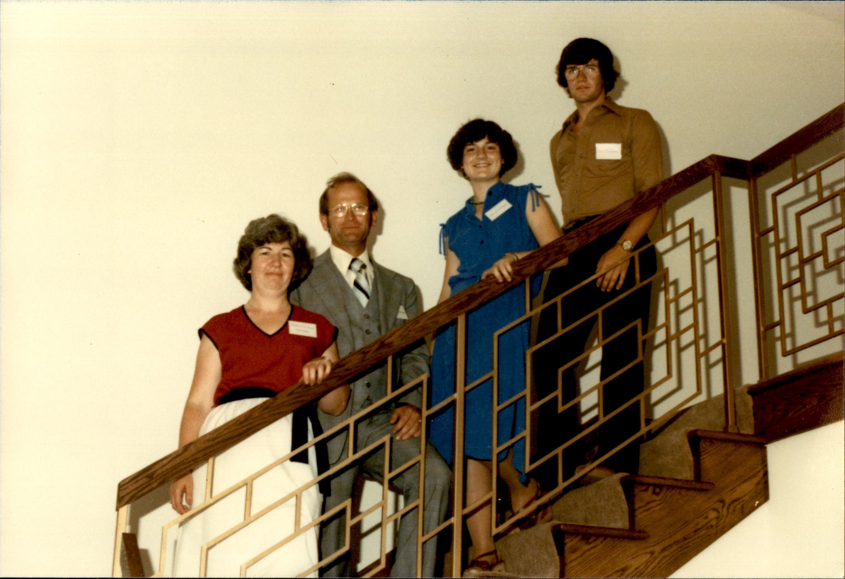 Charlotte, Gene, Ann and David Zartman stand on the stairs of the Zartman Construction office in Sunbury in July of 1979.